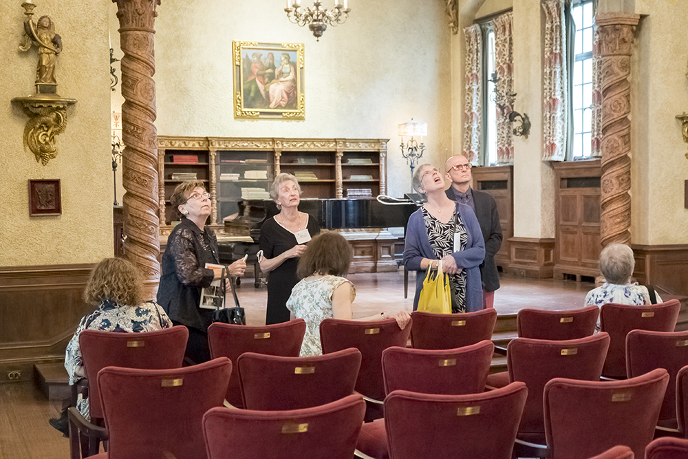 Docent leads a tour in the Music Room